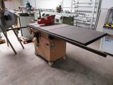 a table that is sitting in a room with a machine