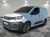 the white van is parked on a checkered floor in a room