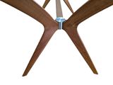 an image of a close up of a wooden table with a glass top