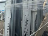 a man that is standing in front of some metal structures