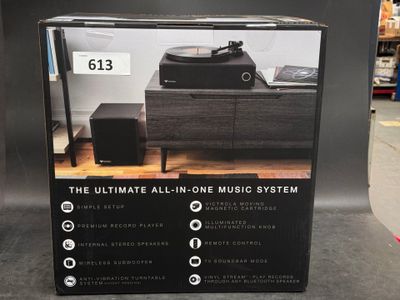 a black box with a picture of a music system on it