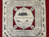an image of a red and white table cloth with a map on it