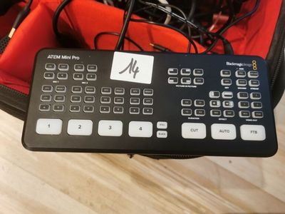 a keyboard that is sitting in a bag on the floor