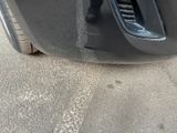 a close up of the front bumper of a car
