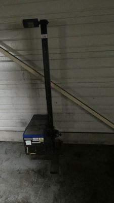 a black and white photo of a garage with a fire hydrant