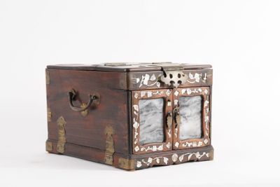 a small wooden box with two pictures inside of it