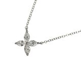 an image of a diamond cross necklace on a chain