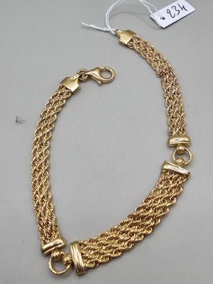 a gold chain bracelet with clasps and clasps