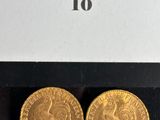 a pair of gold coins from the french empire