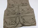a close up of a vest on a hanger on a white background