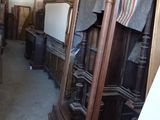 a lot of furniture in a room with a lot of shelves
