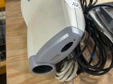 an image of a hair dryer and a cord on a table