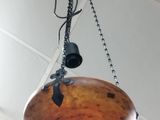a light that is hanging from the ceiling in the room