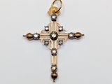 an image of a cross made of gold and diamonds on a white background