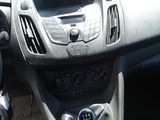 a dashboard of a car with a steering wheel in it