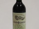 a bottle of wine that is sitting on a table