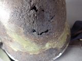 a close up of a helmet on a table