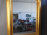 a mirror that is sitting on a table