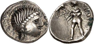 a silver coin with a woman and a man on it