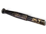 a baseball bat that is sitting on a white surface