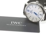 a watch that is sitting on top of a card