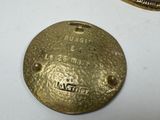 a gold plate that has the name of a person on it