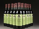 six bottles of red wine are lined up in a row