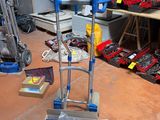 a picture of a work station with tools on the floor