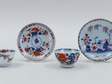 four pieces of chinese blue and white dishes and cups