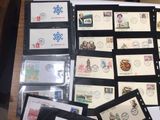 a lot of stamps on a table with a picture frame