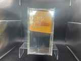 a clear display case with a baseball inside of it