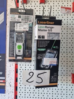 a display of cell phones on the wall in a store