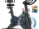 un gros plan sur un vélo d'appartement avec un téléphone portable