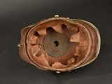 underside view of a helmet with a hole in the middle of it