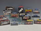 a lot of toy cars that are in a display case