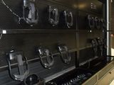 a wall with many different types of cell phones on it