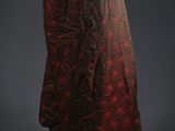 a black and red dress on a mannequin mannequin