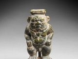 a green jade figurine of a monkey
