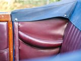 a close up view of a leather seat in a car