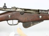 an old rifle with a wooden barrel and metal parts on a white background