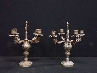 pair of antique silver plated candelabs with flowers and leaves