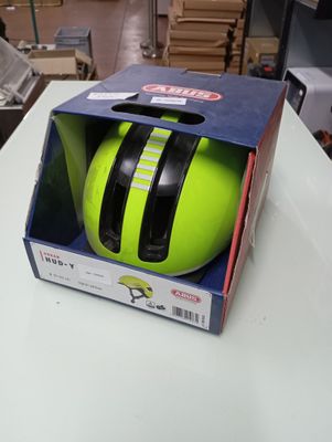 a box with a helmet inside of it on a table