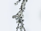 a metal sculpture of a giraffe made out of metal parts