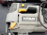 a picture of a corded jig saw sitting on top of a piece of wood