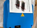 a blue box that has a charger on top of it