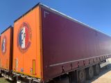 an image of a semi truck parked on the side of the road