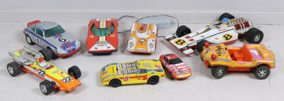 many toy cars that are lined up on a table