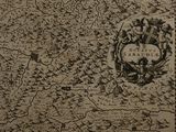 an old map of the kingdom of england with a coat of arms on top of it