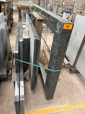 many different types of granite slabs in a store