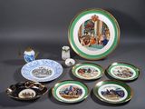 many plates and cups that are sitting on a table